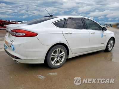 Trzecie zdjęcie samochodu z tyłu: 2018 FORD FUSION SE HYBRID VIN:3FA6P0LU8JR171655 - miniatura