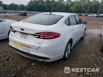 Trzecie zdjęcie samochodu z tyłu: 2018 FORD FUSION SE HYBRID VIN:3FA6P0LU7JR278695 - miniatura