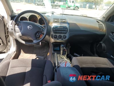 Zdjęcie 8 z 12 samochodu: 2003 NISSAN ALTIMA BASE VIN:1N4AL11E13C242591 - miniatura