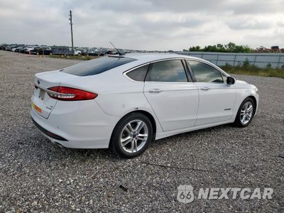 Trzecie zdjęcie samochodu z tyłu: 2018 FORD FUSION SE HYBRID VIN:3FA6P0LU7JR171677 - miniatura