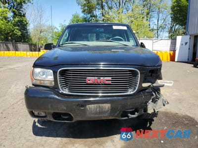 Piąte zdjęcie samochodu w środku: 1999 GMC DENALI VIN:1GKEK13R7XR905572 - miniatura