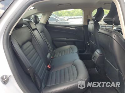 Zdjęcie 10 z 12 samochodu: 2017 FORD FUSION SE HYBRID VIN:3FA6P0LU2HR409722 - miniatura