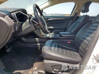 Zdjęcie 7 z 12 samochodu: 2018 FORD FUSION SE HYBRID VIN:3FA6P0LU6JR118663 - miniatura