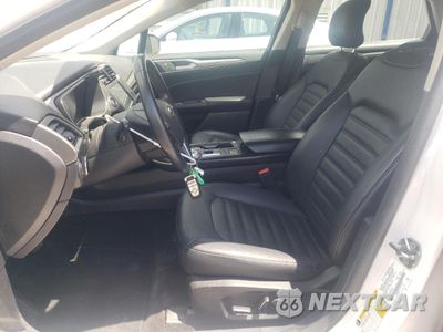 Zdjęcie 7 z 12 samochodu: 2018 FORD FUSION SE HYBRID VIN:3FA6P0LU2JR171800 - miniatura