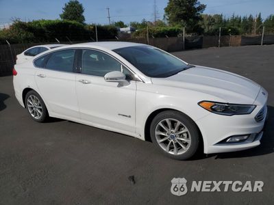 Czwarte zdjęcie samochodu z boku: 2017 FORD FUSION SE HYBRID VIN:3FA6P0LU5HR409150 - miniatura