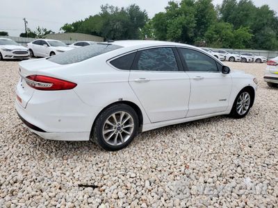 Trzecie zdjęcie samochodu z tyłu: 2017 FORD FUSION SE HYBRID VIN:3FA6P0LU3HR409048 - miniatura