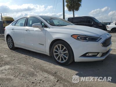 Czwarte zdjęcie samochodu z boku: 2017 FORD FUSION SE HYBRID VIN:3FA6P0LU2HR410045 - miniatura
