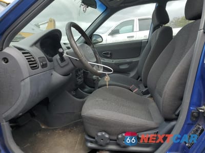 Zdjęcie 7 z 12 samochodu: 2002 HYUNDAI ACCENT GL VIN:KMHCG45C92U291351 - miniatura