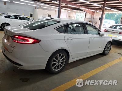 Trzecie zdjęcie samochodu z tyłu: 2017 FORD FUSION SE HYBRID VIN:3FA6P0LU5HR409679 - miniatura