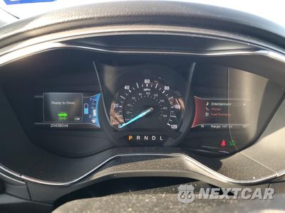 Zdjęcie 9 z 12 samochodu: 2017 FORD FUSION SE HYBRID VIN:3FA6P0LU3HR409549 - miniatura