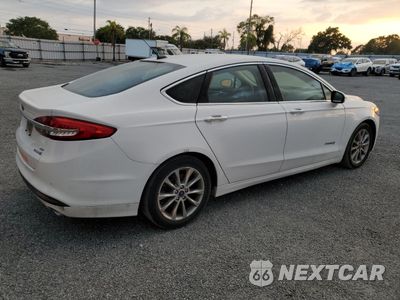 Trzecie zdjęcie samochodu z tyłu: 2017 FORD FUSION SE HYBRID VIN:3FA6P0LUXHR409578 - miniatura