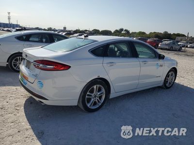 Trzecie zdjęcie samochodu z tyłu: 2018 FORD FUSION SE HYBRID VIN:3FA6P0LU4JR278699 - miniatura