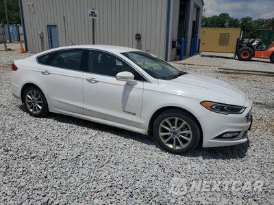 Czwarte zdjęcie samochodu z boku: 2017 FORD FUSION SE HYBRID VIN:3FA6P0LU6HR410050 - miniatura