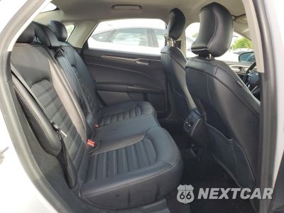 Zdjęcie 10 z 12 samochodu: 2018 FORD FUSION SE HYBRID VIN:3FA6P0LU0JR118609 - miniatura