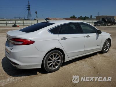 Trzecie zdjęcie samochodu z tyłu: 2017 FORD FUSION SE HYBRID VIN:3FA6P0LU4HR409107 - miniatura