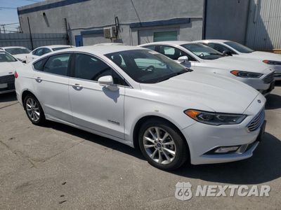 Czwarte zdjęcie samochodu z boku: 2017 FORD FUSION SE HYBRID VIN:3FA6P0LU9HR408941 - miniatura