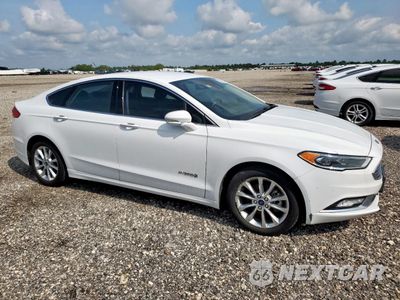 Czwarte zdjęcie samochodu z boku: 2017 FORD FUSION SE HYBRID VIN:3FA6P0LU9HR409006 - miniatura