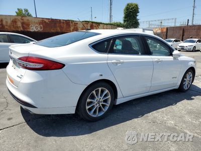Trzecie zdjęcie samochodu z tyłu: 2017 FORD FUSION SE HYBRID VIN:3FA6P0LU6HR409321 - miniatura