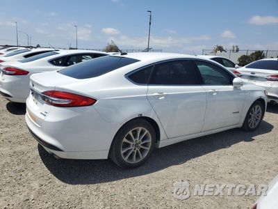 Trzecie zdjęcie samochodu z tyłu: 2017 FORD FUSION SE HYBRID VIN:3FA6P0LU7HR409702 - miniatura