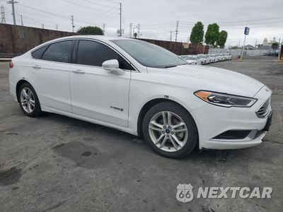 Czwarte zdjęcie samochodu z boku: 2018 FORD FUSION SE HYBRID VIN:3FA6P0LU9JR118673 - miniatura