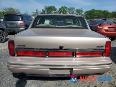 Zdjęcie 6 z 12 samochodu: 1997 LINCOLN TOWN CAR EXECUTIVE VIN:1LNLM81W7VY737737 - miniatura