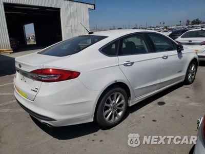 Trzecie zdjęcie samochodu z tyłu: 2017 FORD FUSION SE HYBRID VIN:3FA6P0LU0HR409153 - miniatura