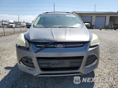 Piąte zdjęcie samochodu w środku: 2014 FORD ESCAPE TITANIUM VIN:1FMCU0J91EUB04913 - miniatura