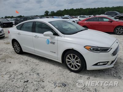 Czwarte zdjęcie samochodu z boku: 2017 FORD FUSION SE HYBRID VIN:3FA6P0LU9HR359689 - miniatura