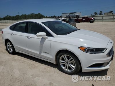 Czwarte zdjęcie samochodu z boku: 2018 FORD FUSION SE HYBRID VIN:3FA6P0LU9JR178470 - miniatura