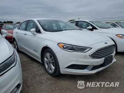 Czwarte zdjęcie samochodu z boku: 2018 FORD FUSION SE HYBRID VIN:3FA6P0LU5JR172021 - miniatura