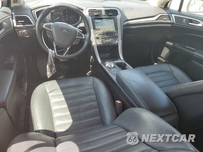 Zdjęcie 8 z 12 samochodu: 2018 FORD FUSION SE HYBRID VIN:3FA6P0LU7JR171727 - miniatura