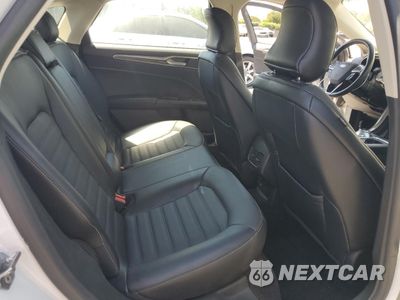 Zdjęcie 10 z 13 samochodu: 2018 FORD FUSION SE HYBRID VIN:3FA6P0LU1JR152459 - miniatura