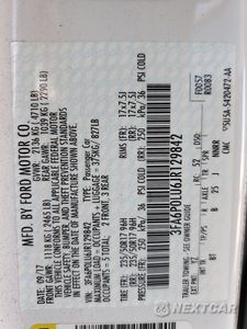 Zdjęcie 12 z 13 samochodu: 2018 FORD FUSION SE HYBRID VIN:3FA6P0LU6JR129842 - miniatura