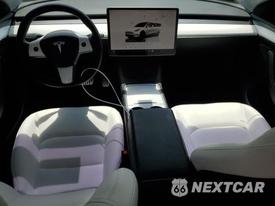 Zdjęcie 8 z 14 samochodu: 2023 TESLA MODEL Y VIN:7SAYGDEF8PF665049 - miniatura