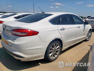 Trzecie zdjęcie samochodu z tyłu: 2017 FORD FUSION SE HYBRID VIN:3FA6P0LU7HR410056 - miniatura