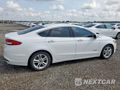 Trzecie zdjęcie samochodu z tyłu: 2018 FORD FUSION SE HYBRID VIN:3FA6P0LUXJR171690 - miniatura