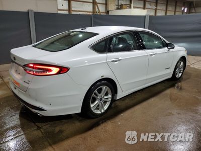 Trzecie zdjęcie samochodu z tyłu: 2018 FORD FUSION SE HYBRID VIN:3FA6P0LUXJR118813 - miniatura