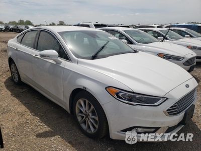 Czwarte zdjęcie samochodu z boku: 2017 FORD FUSION SE HYBRID VIN:3FA6P0LU8HR410065 - miniatura