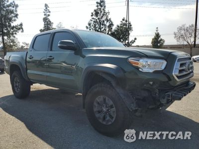 Czwarte zdjęcie samochodu z boku: 2021 TOYOTA TACOMA DOUBLE CAB VIN:5TFAZ5CN6MX101460 - miniatura