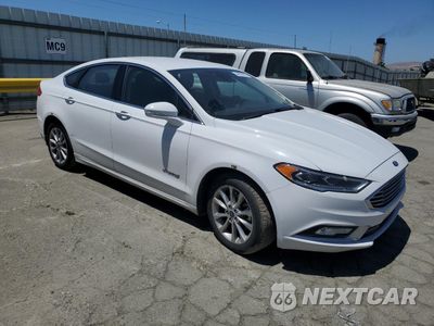 Czwarte zdjęcie samochodu z boku: 2017 FORD FUSION SE HYBRID VIN:3FA6P0LU8HR408932 - miniatura