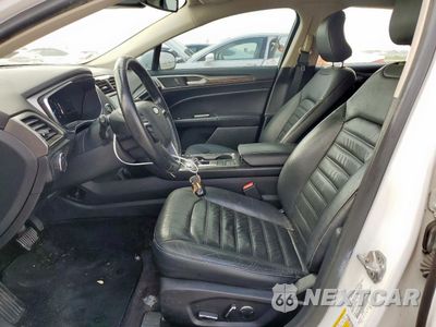 Zdjęcie 7 z 13 samochodu: 2017 FORD FUSION SE HYBRID VIN:3FA6P0LU3HR409387 - miniatura