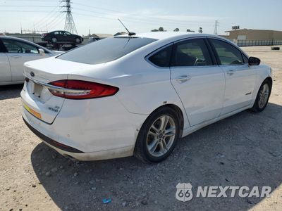 Trzecie zdjęcie samochodu z tyłu: 2018 FORD FUSION SE HYBRID VIN:3FA6P0LU4JR171748 - miniatura