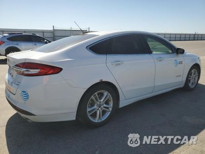Trzecie zdjęcie samochodu z tyłu: 2018 FORD FUSION SE HYBRID VIN:3FA6P0LU9JR152452 - miniatura