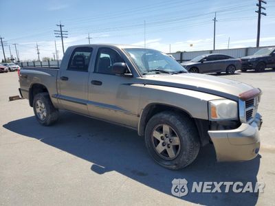 Czwarte zdjęcie samochodu z boku: 2006 DODGE DAKOTA QUAD SLT VIN:1D7HW48NX6S709353 - miniatura