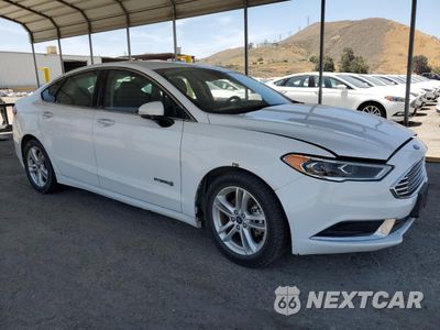Czwarte zdjęcie samochodu z boku: 2018 FORD FUSION SE HYBRID VIN:3FA6P0LU4JR129953 - miniatura
