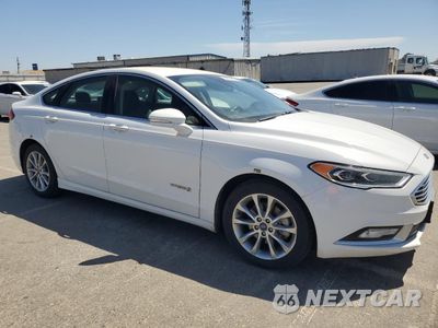 Czwarte zdjęcie samochodu z boku: 2017 FORD FUSION SE HYBRID VIN:3FA6P0LU4HR410080 - miniatura