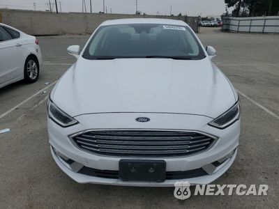 Piąte zdjęcie samochodu w środku: 2017 FORD FUSION SE HYBRID VIN:3FA6P0LUXHR409757 - miniatura