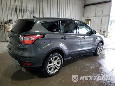Trzecie zdjęcie samochodu z tyłu: 2017 FORD ESCAPE SE VIN:1FMCU9GD6HUD14881 - miniatura
