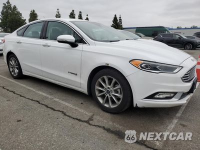 Czwarte zdjęcie samochodu z boku: 2017 FORD FUSION SE HYBRID VIN:3FA6P0LU1HR410053 - miniatura