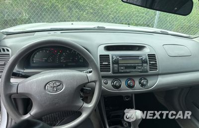 Zdjęcie 9 z 11 samochodu: 2003 TOYOTA CAMRY LE VIN:4T1BE32K43U207204 - miniatura